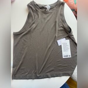 Lululemon Train to Be Nomad colored tank top size 10 NWT